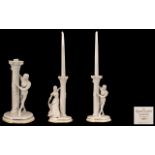 Franklin Mint Pair of Romeo and Juliet Fine Porcelain Pair of Figural Candlesticks.