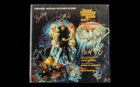 James Bond Rare Record - 8 Autographs Inc Sean Connery John Barry & Cubby Broccoli.