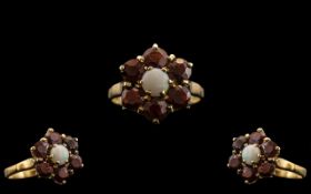 Ladies 9ct Gold Garnet and Opal Set Cluster Ring - Flower head Setting.