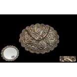 Turkish Silver Embossed Ottoman Design Shaped Hand Mirror, decorated to the body with flowers in