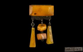 Baltic Amber Brooch. Butterscotch amber brooch mounted on hall marked silver. Russian/Ukranian, 2.