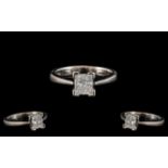 Platinum Single Stone Diamond Set Ring of Contemporary Design.