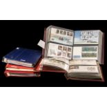 Collection of First Day Cover Stamps housed in albums, including Guernsey, Alderney,