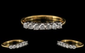 18ct Gold - Attractive Seven Stone Diamond Set Dress Ring. Fully Hallmarked for 750 - 18ct. The