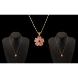 Sterling Silver Pendant And Necklace In A Rose Gold Finish,