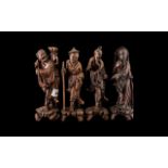 Collection of Four Antique Chinese Root Wood Carved Figures of Deities.
