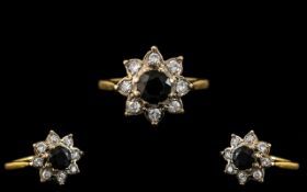 Ladies 18ct Gold Attractive Diamond and Sapphire Set Cluster Ring - Flower head Setting. Marked 18ct