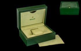 Rolex Box. Rolex box in green, with outer packaging.