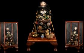 Pedlar Doll in Case, the doll depicting an old lady selling her wares, carrying a basket holding a