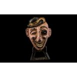 Novelty Cast Metal Bottle Opener, the image of a mischievous Victorian gentleman, glass moving eye,