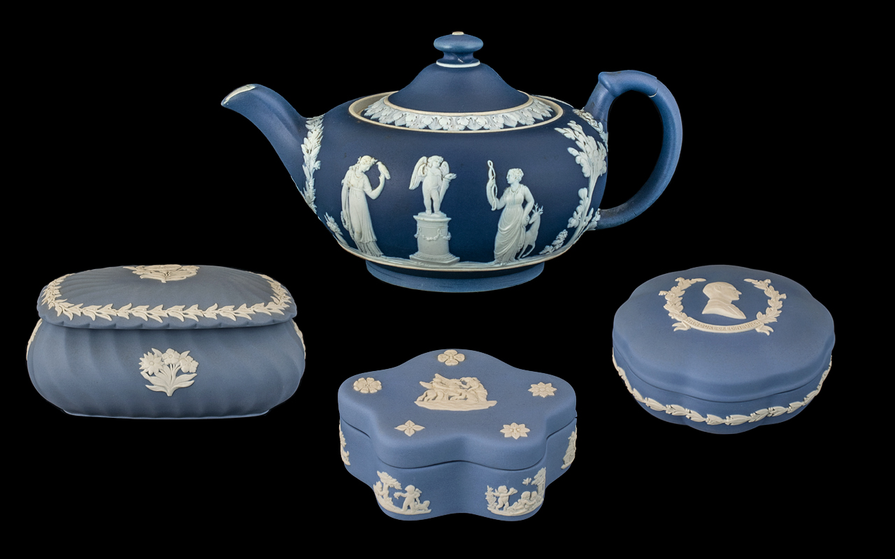 Collection of Wedgewood Pottery including tea pot and lidded pots, four pieces in total.