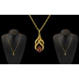 Ladies 9ct Gold - Attractive Pendant Drop Set with Rubies and Attached to 9ct Gold Link Design