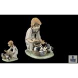 Lladro - Hand Painted Porcelain Figure ' Joy In a Basket ' Girl with Puppies. Model 5595.