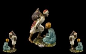 Reproduction Cold Painted Bronze Figure Group of two Arab men, 2" in height,