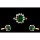 18ct Gold Attractive Emerald & Diamond Set Ring marked 750 to interior of shank.