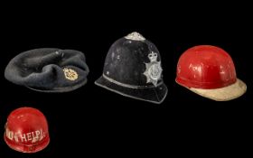 Collection of Hats/Helmets. Comprising: Police Helmet, Horse Racing Cap; and RAF Beret with Badge.