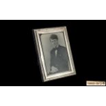 Silver Photo Frame. Hallmark for London 1994. 10 inches by 7 1/2 inches.