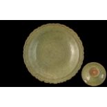 Chinese Antique Ming Period Celadon Glazed Shallow Lotus Shaped Bowl, with a moulded and incised