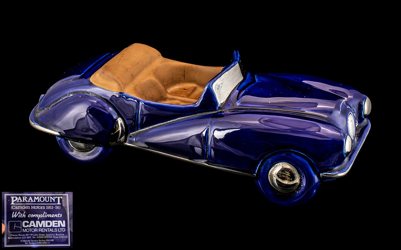 A Paramount (Camden Motors 1953-56) Pottery model of an open topped sports car.