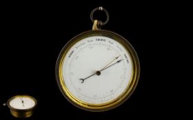 Antique FIne Quality Brass Cased Aneroid Ships Barometer. Number 62.
