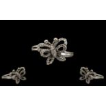 Superb Diamonte Butterfly Ring Set In White 9ct Gold.