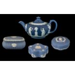 Collection of Wedgewood Pottery including tea pot and lidded pots, four pieces in total. Please