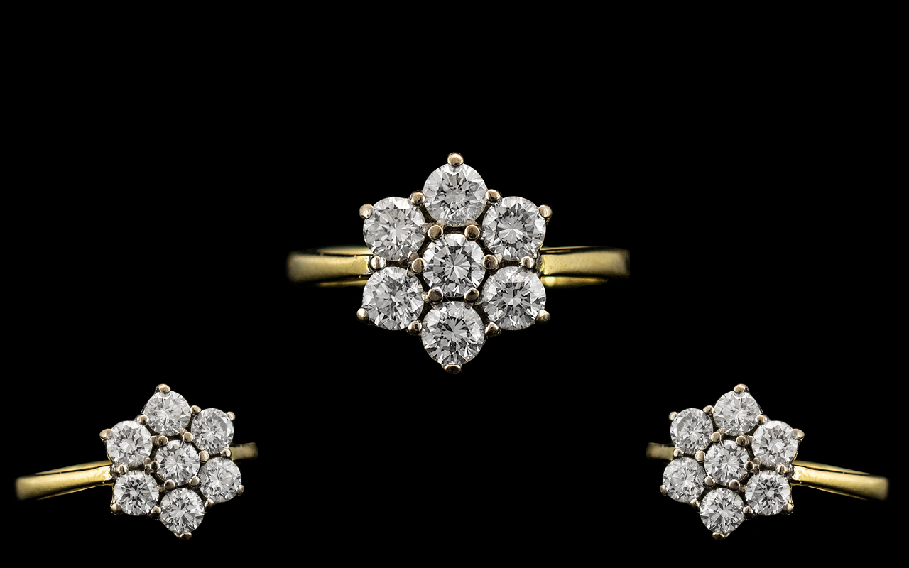 18ct Gold - Ladies Attractive 7 Stone Diamond Set Cluster Ring. Full Hallmark for 18ct - 750.