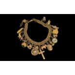 Antique 9ct Gold Double Curb Bracelet Loaded with 19 Gold Charms,