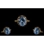 Ladies - Attractive Single Stone Blue Topaz Set Ring with Full Hallmark for 9ct. Ring Size L.