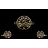 9ct Gold and Diamond Ring. Depicting The Tree of Life, Good Condition In All Aspects. Ring Size P.