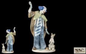 Nao by Lladro Hand Painted Porcelain Figure - Circus Clown, Ball In Hand with Small Dog. Height 11.