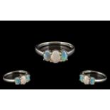 Ladies 3 Stone Set Opal Ring In Silver. Opals are of Good Size and Colour. Hallmarked for Silver.