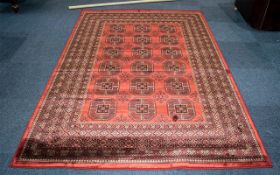 A Genuine Cashmere Red Ground Carpet/Rug. Bukhara design.As new condition. Measures 2.40 by 1.