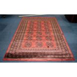 A Genuine Cashmere Red Ground Carpet/Rug. Bukhara design.As new condition. Measures 2.40 by 1.