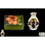Moorcroft Tube lined Lidded Trinket Box ' Coral Hibiscus ' Pattern on Green Ground. 3.5 Inches - 8.