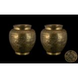 Pair of Antique Brass Bulbous Shaped Vases engraved to the body with birds amongst flowers.