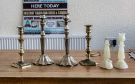 A Collection of Three Pairs of Candlesticks to include brass and alibaster.