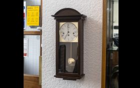 Kieninger - Superb Quality Dark Walnut Cased 8 Day Striking and Chiming Pendulum Driven Wall Clock.