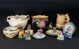 A Box of Assorted Pottery to include various porcelain figures, assorted plates, a Deco Bowl,
