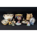 A Box of Assorted Pottery to include various porcelain figures, assorted plates, a Deco Bowl,