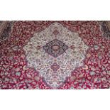 A Genuine Cashmere Large Red Ground Marrakech Carpet/Rug. As new condition. Measures 2.40 by 3.