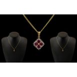 9ct Gold Attractive Ruby and Diamond Set Pendant - Attached to a 9ct Gold Chain.