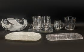 Ten Pieces of Assorted Glassware, comprising two square 10'' platters, an opaque oblong tray 14'',