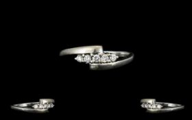 14ct White Gold Contemporary Designed Diamond Set Dress Ring of Pleasing Form.