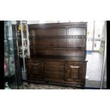 A Stained Oak Priory Dresser And Rack, Of Traditional Form,