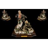 Capodimonte Porcelain Group of a Hunter with His Dog, Mounted on a Wooden Base,