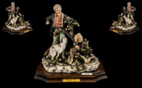 Capodimonte Porcelain Group of a Hunter with His Dog, Mounted on a Wooden Base,