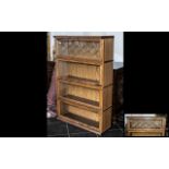 A Modern Style Oak Globe Style Glazed Front Stacking Bookcase,