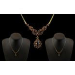 Ladies 9ct Gold - Attractive Garnet Set Necklace of Elegant Form / Design. Full Hallmark for 9.375.