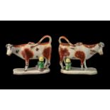 Matched Pair of Antique Staffordshire Cow Creamer Jugs, depicting a seated milkmaid milking a